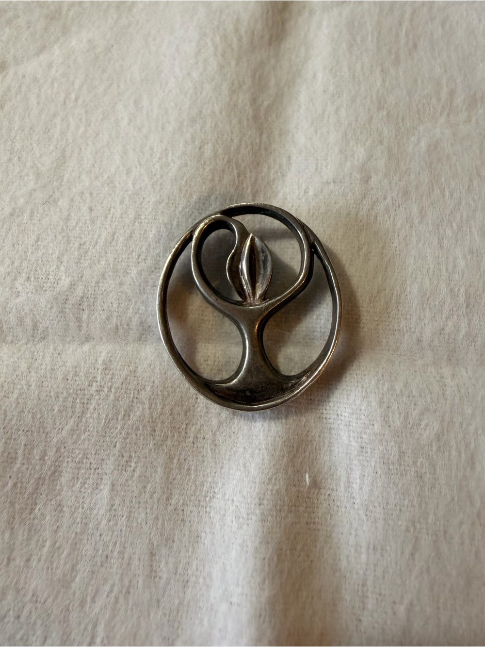 Silver Tone Floral Round pendant